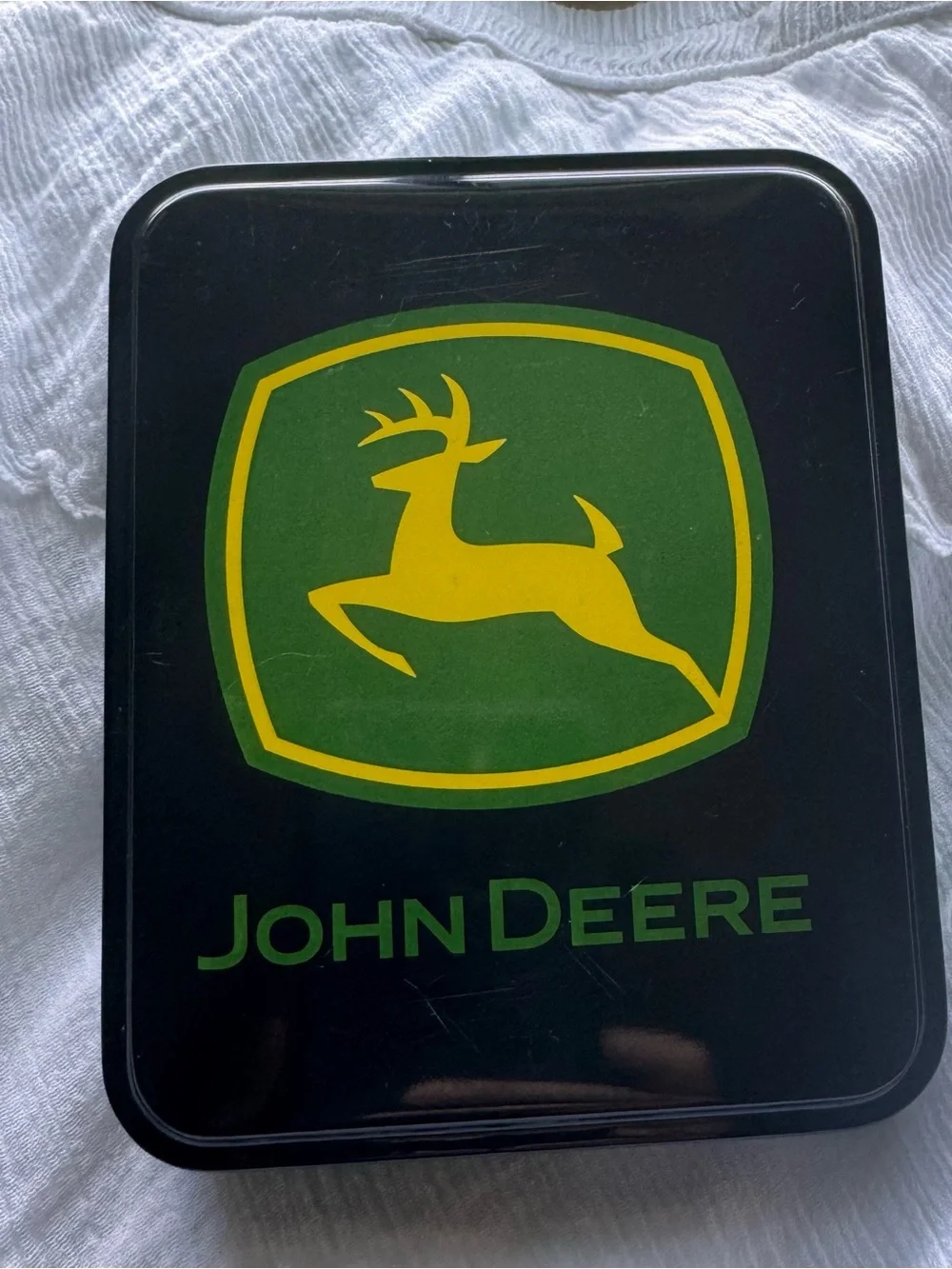 John Deere genuine leather money clip wallet in its original collectible tin.